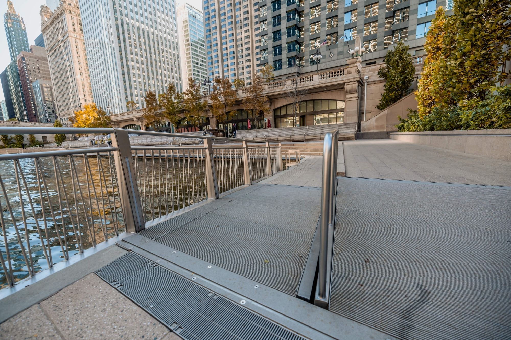 Grating ramp and bridge allow airflow and drainage at the Chicago Riverwalk